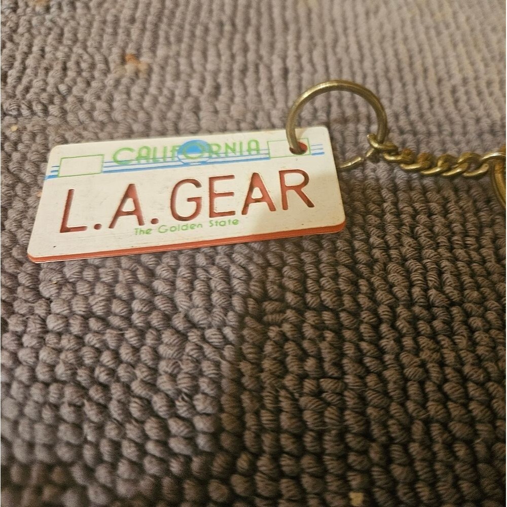 1980's L.A. Gear California license plate keychain tag